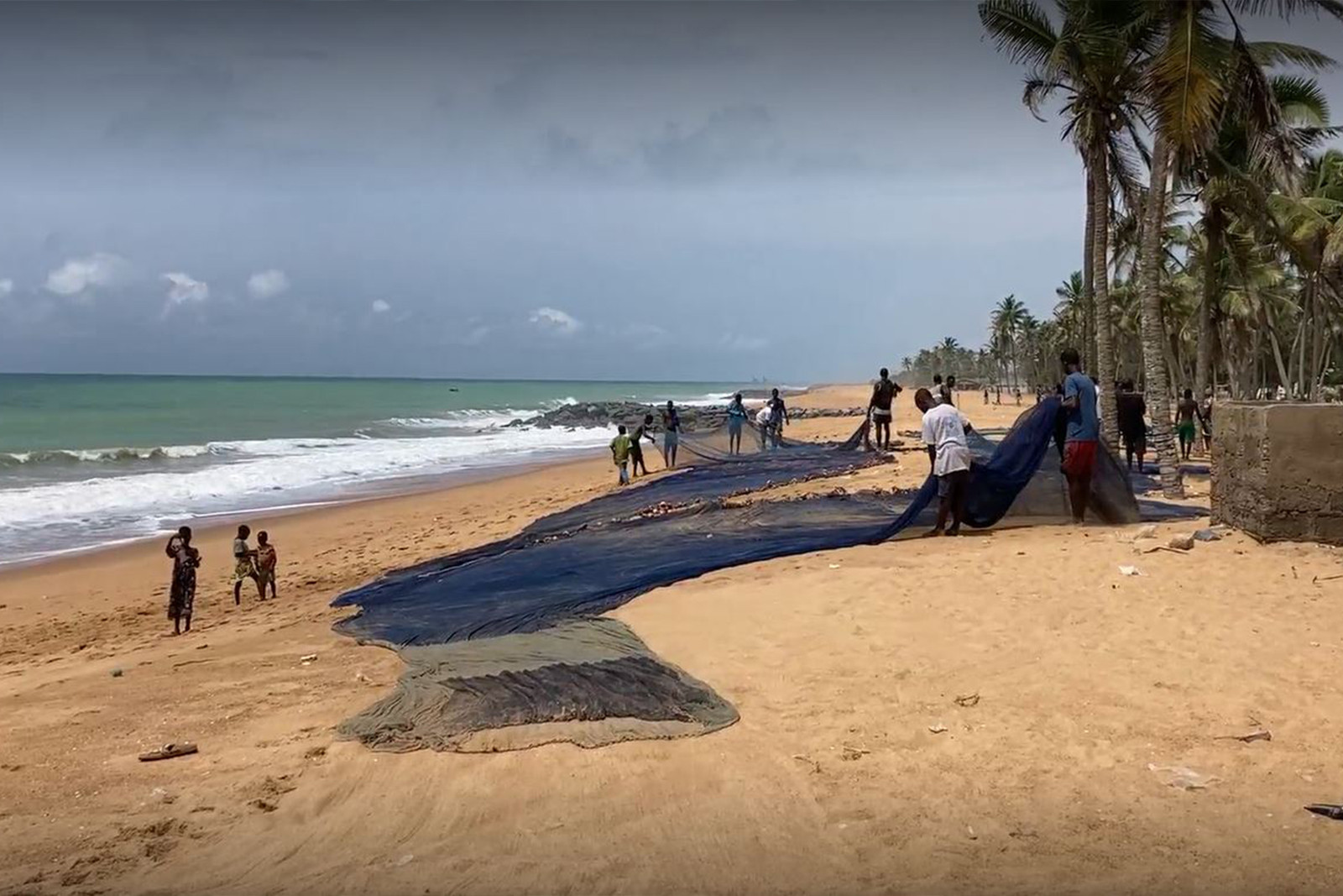 Fishermen on the beach in Togo